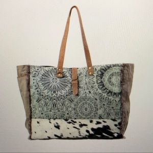 myra duffle bag; cowhide